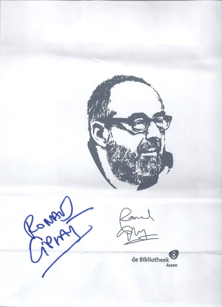 Draagtasje met het gezicht en handtekening van Ronald Giphart gemaakt door de Bibliotheek Assen